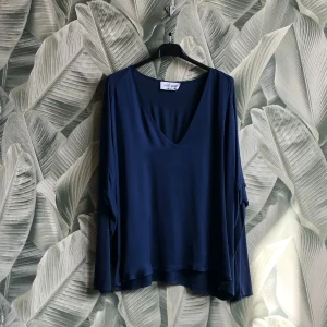 Blusa con scollo a V